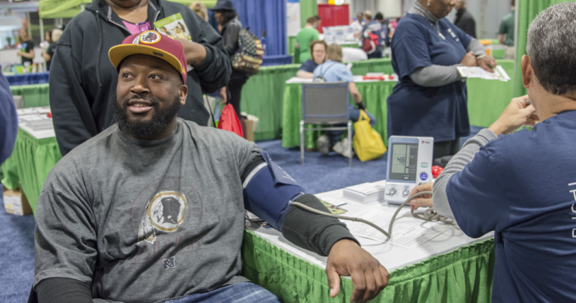 Trenin Jones getting his blood pressure taken